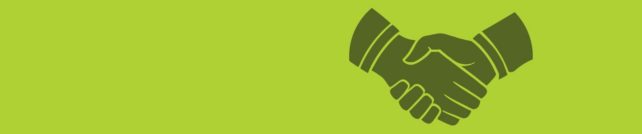 two hands are touching each other on a green background